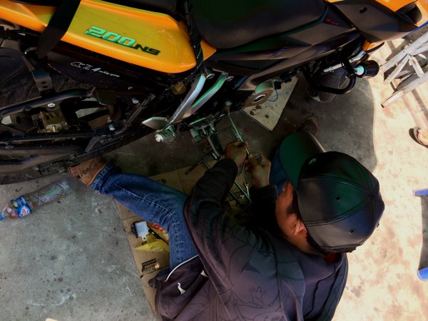The shop guy working on my rear brake master cylinder.